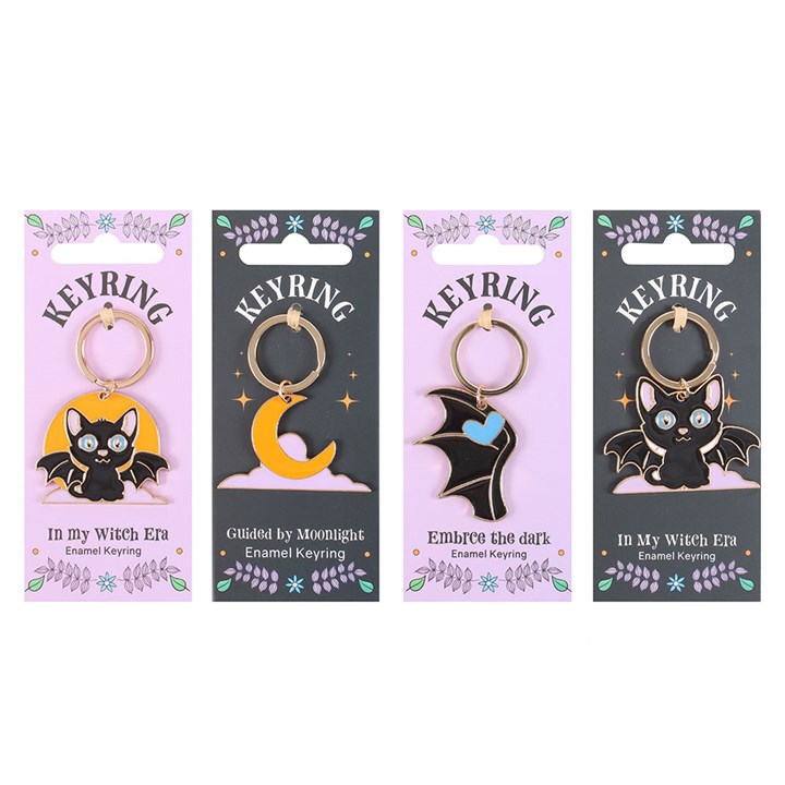 Set of 24 Cute and Creepy Keyrings on Display - Image 4